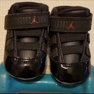 Black and red Jordan 11 retro shoes